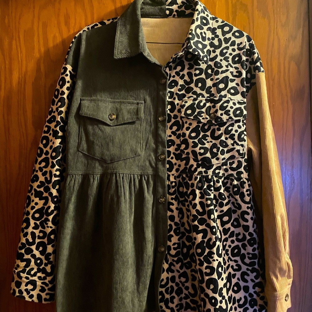 Woman’s large corduroy, leopard, and khaki shirt.